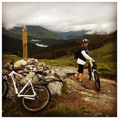 Jules Anderson at the Cairn near the saddle between Cnoc Coinnich and The Brack Scotland